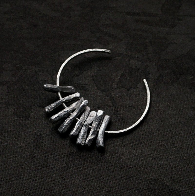 suzuki yuki / “White breath spills, bathed in the light coming from the east.”