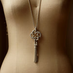 GIFTED / IMPLOSION CROSS NECKLACE TASSEL M PV（OVFC_80cm）