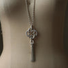 GIFTED / IMPLOSION CROSS NECKLACE TASSEL M PV（IMPLOSION NECK CHAIN ROΦ1H 80cm）