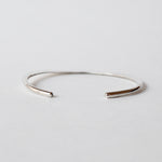 in Her Moon Bangle