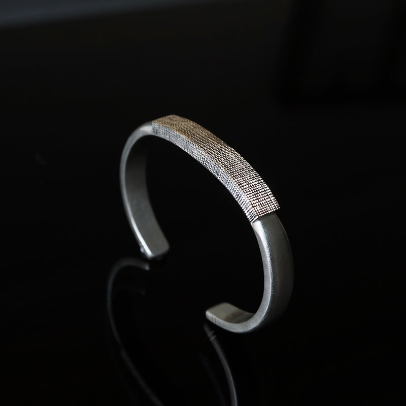GERMEDEUR / CLOUS DE PARIS Bangle K18YG×SV（center）
