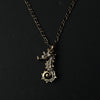 cocoon / seahorse necklace brass