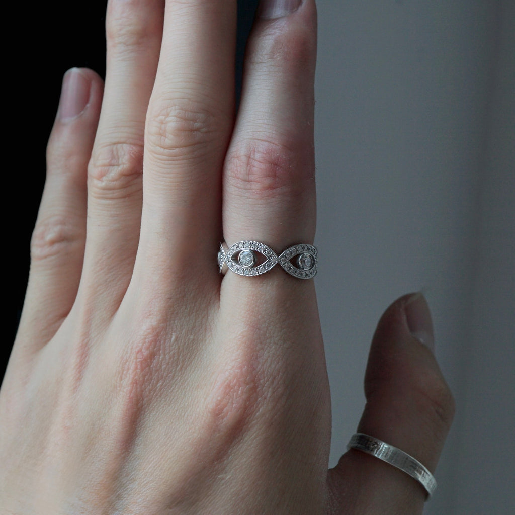 Kagann / Evil eye full eternity ring Pt900