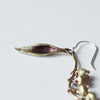 cocoon / linseed earrings brass