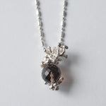 cocoon / "sea lucky charm" necklace smoky quartz