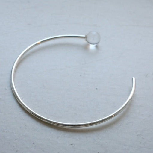 in her Orbit bangle
