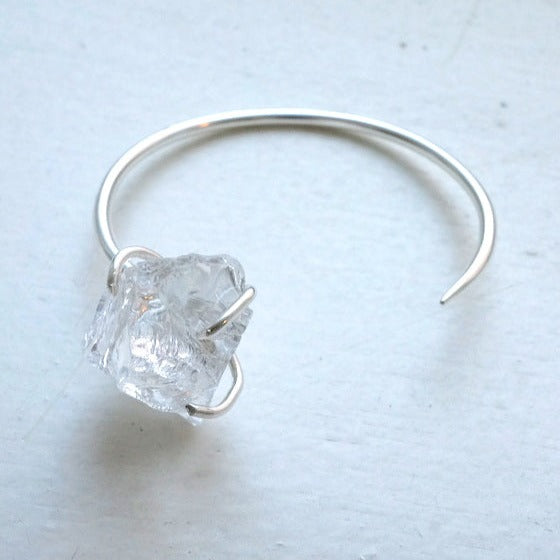 in her  Ice claw open bangle