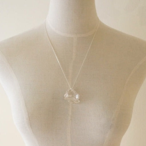 in her  Ice claw necklace