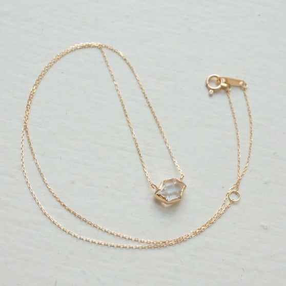 in her  K10 Wrapping Herkimer diamond  necklace