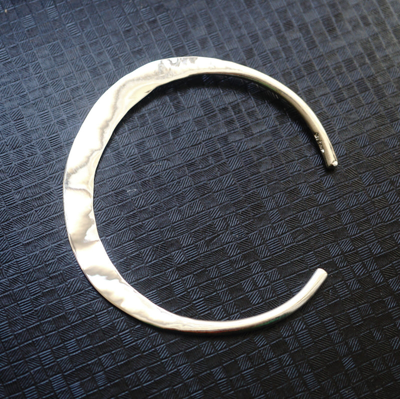 in Her Moon Bangle