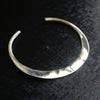 in Her Moon Bangle
